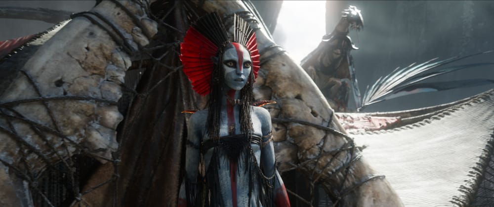 The Na'vi Varang, leader of the Ash Mangkwan clan, standing outside her tent.